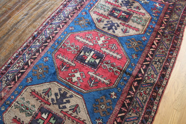 #58 kazak rug 56"x102"