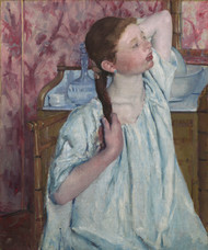 Girl Arranging Her Hair 1886 by Mary Cassatt Framed Print on Canvas