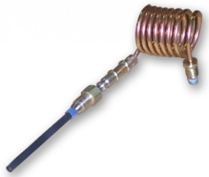 A picture of a thermocouple — a coil of copper tubing with valves on both ends
