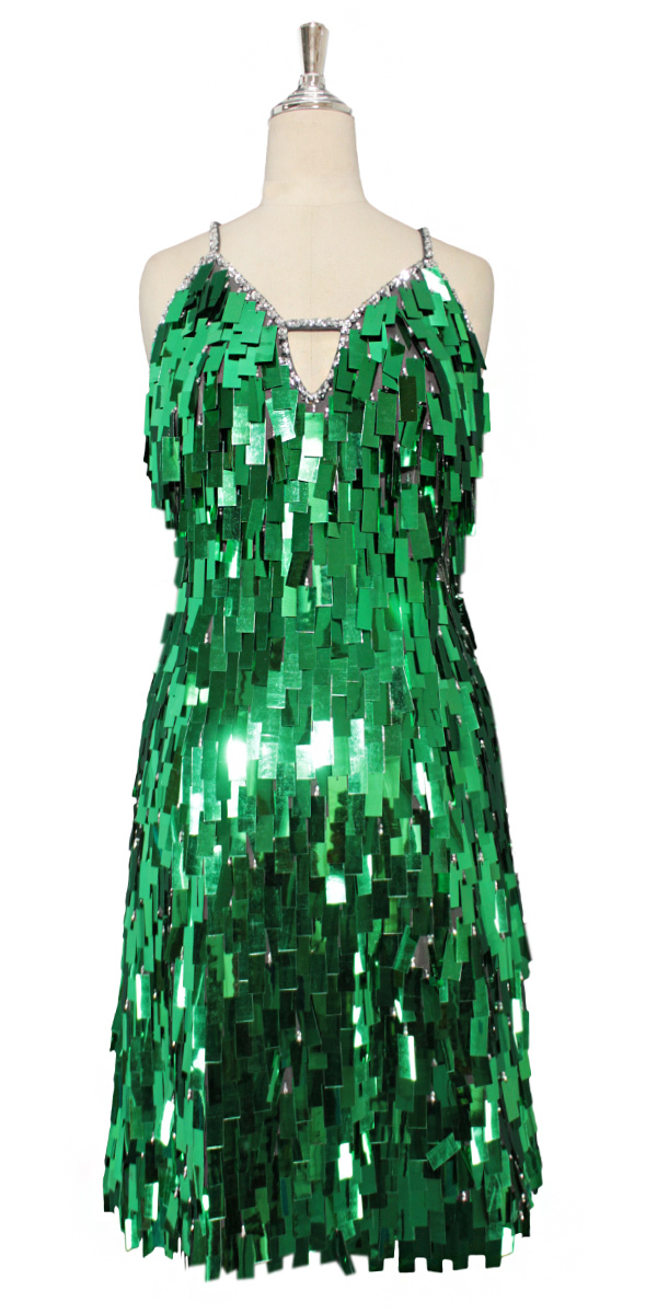 A short handmade sequin dress, in rectangular emerald green paillette  sequins with silver faceted beads, a luxe grey fabric background and a  straight hemline.