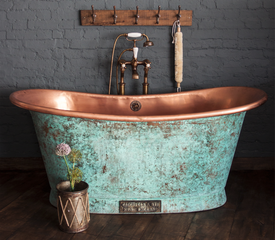 rustica copper bathtub in a rustic bathroom