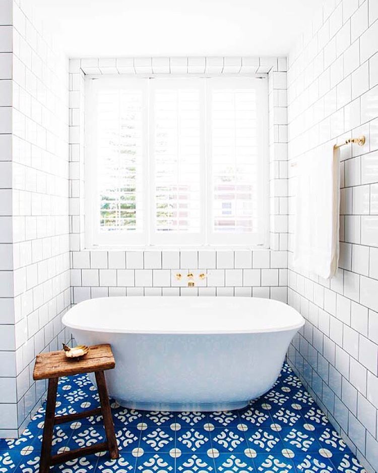 white blue ceramic tiles from Mexico decorating bathroom wall