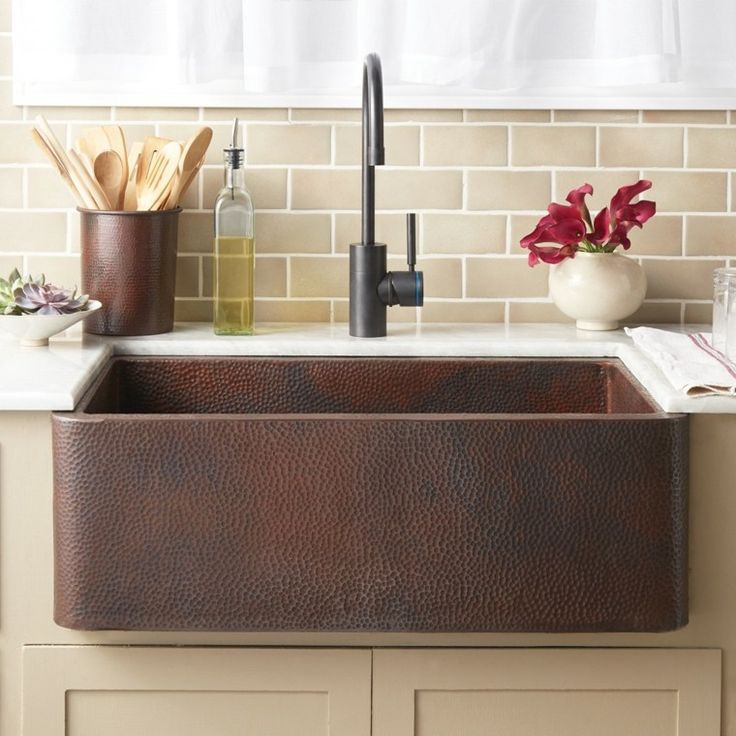 rustic copper sink made for a custom kitchen