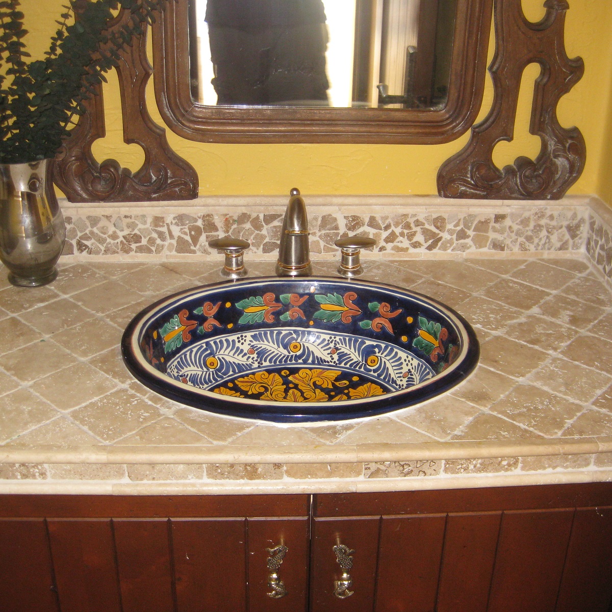 mexican tiles and talavera sinks in rustic bathroom