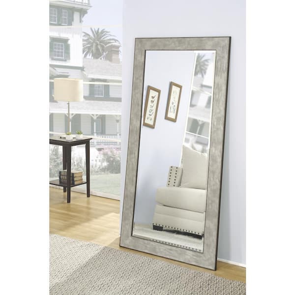 mirrors with zinc frames decorating a living room wall