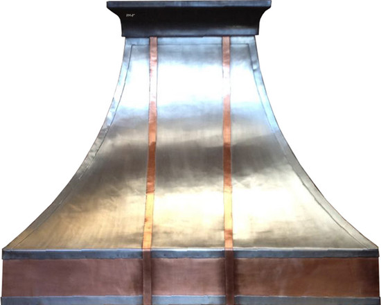 Rustic zinc range hood with a copper apron