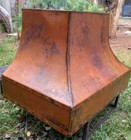copper insert range hood with antique patina finishing