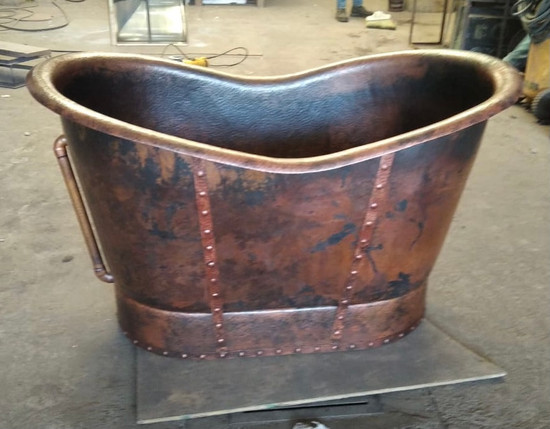 antique copper bathtub with straps