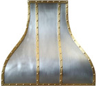 Handcrafted Virginia Zinc Brass Range Hood featuring brass straps for a modern and rustic kitchen design.