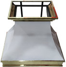 front view of brass metal range hood for a kitchen in white color