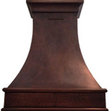 Front view of the Abilene style copper range hood custom hammered, featuring gracefully sloping walls, a smooth hand-hammered surface, two horizontal round moldings, and a curved crown molding, all finished in dark patina.
