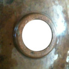 back view of moroccan bathroom sink designed in hammered copper