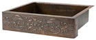 Front view of the large copper apron sink with a Fleur-de-lis embossed apron