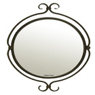 Front view of the Iron Mirror Puebla, showcasing its oval colonial-style frame in a rustic iron finish.