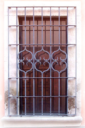 Mediterranean forged iron window guards