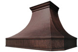 Burlington style copper range hood featuring a sloping shape, small crown molding, and a dark hammered patina.