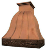 Charlottetown style copper range hood online with a rustic sloping shape and decorative girasol motif apron.