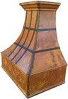 copper range hood decorated with straps