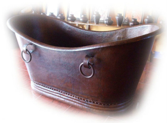 Mexican style copper bathtub front view showcasing the coffee patina finish, oval shape, and decorative rings.