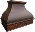 Front view of rustic kitchen copper range hood  in New York style with bell-style shape.