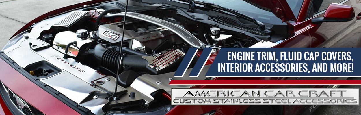 A banner ad for American Car Craft - Custom stainless steel accessories featuring a pictuer of a car's engine which has been outfitted with stainless steel embellishments. The image text reads "Engine Trim, Fluid Cap Covers, Interior Accessories, and More