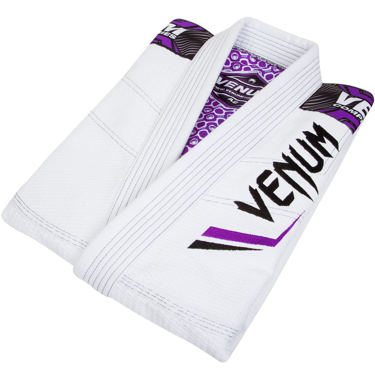 Venum Elite Jiu Jitsu Gi in White and purple.  Now available at www.thejiujitsushop.com Front of gi in white and purple

Enjoy free shipping from The Jiu Jitsu Shop.  Top quality brazilian jiu-jitsu gear for men women and kids.
