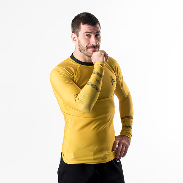Fusion FG Star Trek Classic Uniform Rashguard - Gold an awesome homage to Captain James T Kirk himself.  Awesome rashguards from www.thejiujitsushop.com 

Enjoy Free Shipping from The Jiu Jitsu Shop. Shop Star trek including blue and red uniforms