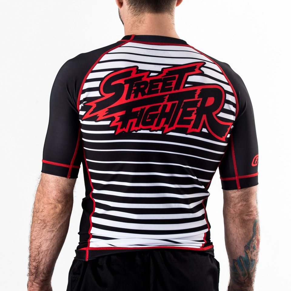 Back of street fighter ryu rashguard at www.thejiujitsushop.com Large Street Fighter logo on teh back outlined in red.  

Enjoy free shipping from The Jiu Jitsu Shop today!