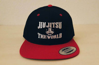 OGA Open Guard Apparel Jiu Jitsu vs The World Snapback hat.  Red black hat with white embroidery in the background of his picture..  Jiu Jitsu vs the world series from Open guard apparel. 

Enjoy Free Shipping on all products storewide today. 