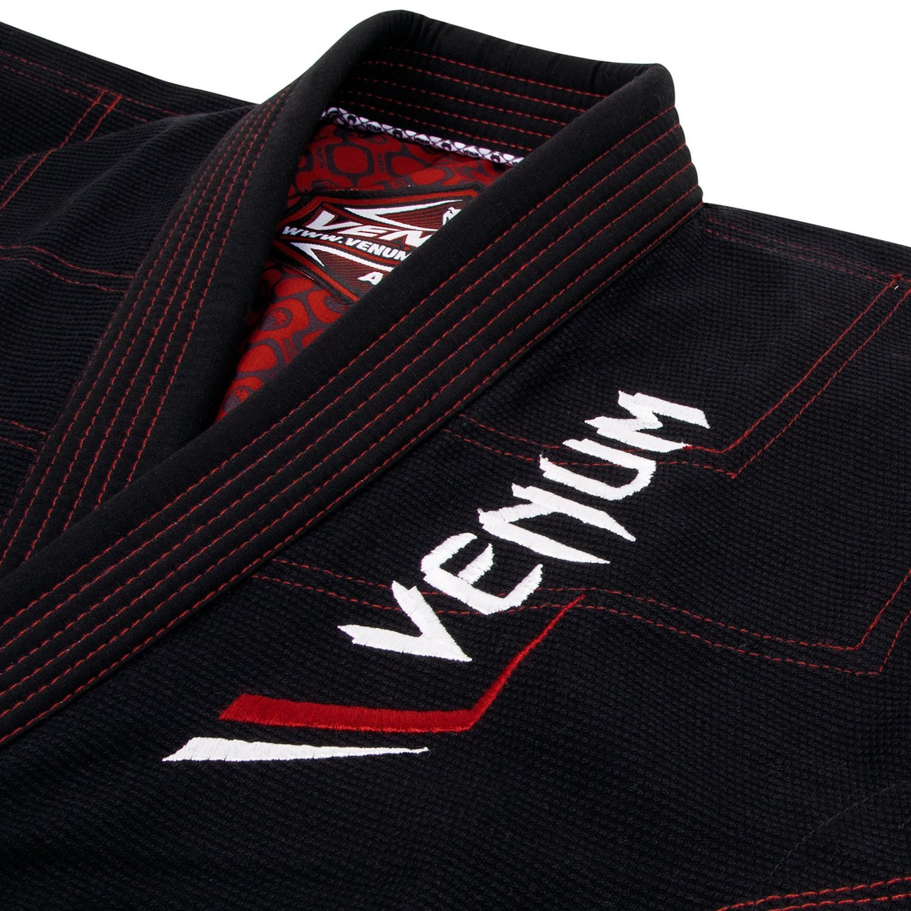 gi top zoomed in to logo Venum Elite Light BJJ GI in Black is now available at www.thejiujitsushop.com

Enjoy Free Shipping from The Jiu Jitsu Shop today! 