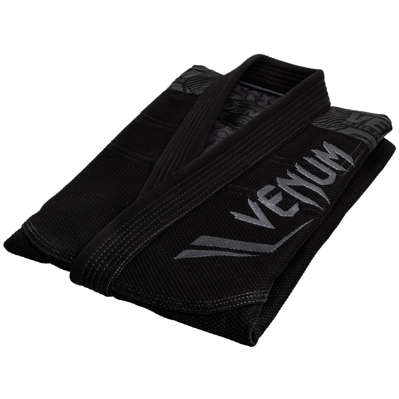 Folded gi of the Venum Elite BJJ GI in Black on black  is now available at www.thejiujitsushop.com

Enjoy Free Shipping from The Jiu Jitsu Shop today! 
