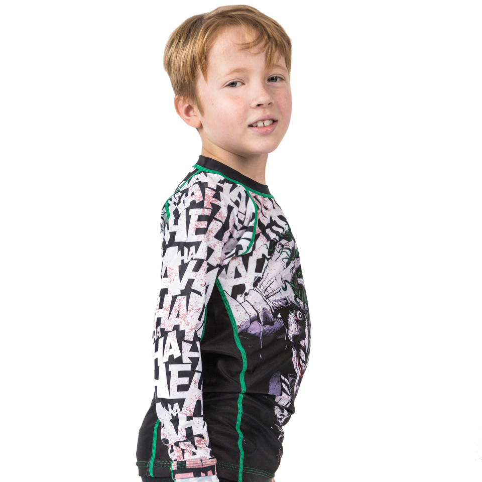 side view for the kids rashguard Fusion FG Batman The Killing Joke Kids BJJ Rashguard is available at www.thejiujitsushop.com  Officially licensed Batman Gear. 

Enjoy Free Shipping from The Jiu Jitsu Shop today! 