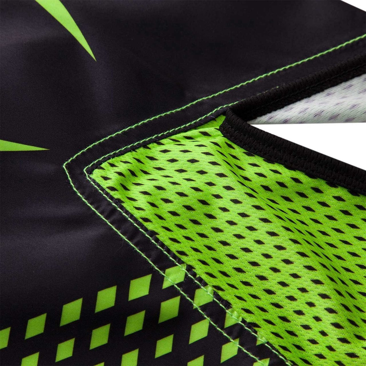 side panel of the Venum Hurricane Fight Shorts now available at www.thejiujitsushop.com Bring black and green shorts to take on the world. 

Enjoy Free Shipping from The Jiu Jitsu Shop today!