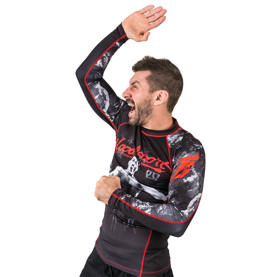 Karate chop with model and the officially licensed bloodsport Rashguard
