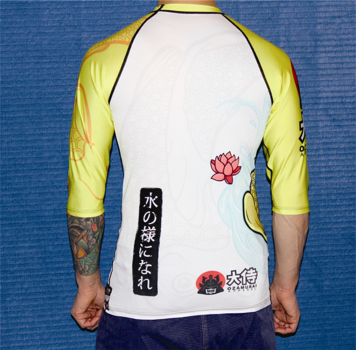 Kozamurai Yellow Koi Adult Rashguard shoot back @ www.thejiujitsushop.com