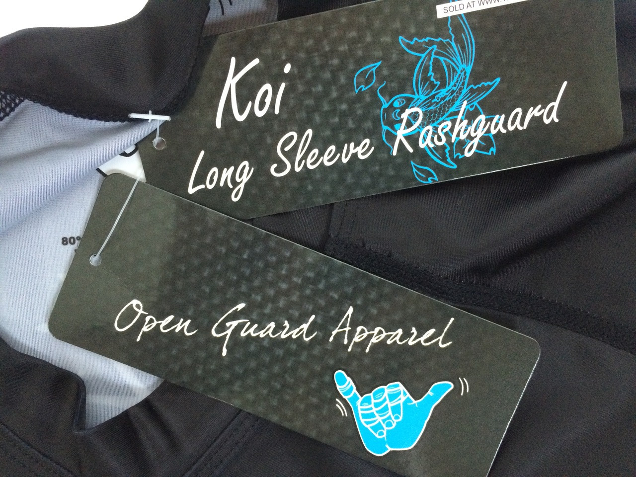 OGA's Kool Koi Long Sleeve Rashguard, sold exclusively by The Jiu Jitsu Shop. Free shipping, storewide.