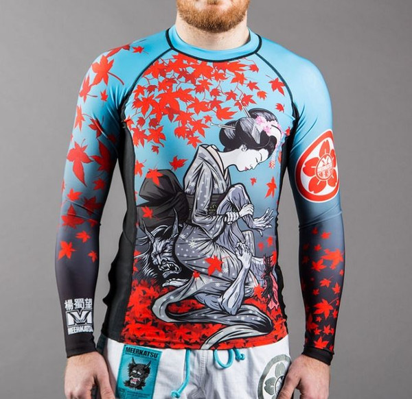 Meerkatsu Graceful Kimura Rashguard now available at www.thejiujitsushop.com.  Beautiful rashguard in blue with a dramatic scene of a japanese lady in a traditional kimono taking out the much larger and evil looking demon.  

Enjoy complimentary shipping from your friends at The Jiu Jitsu Shop!