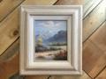 Art oil painting. Desert, Cactus, Mountains and Sky. White frame 