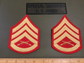 An authentic pair of matched US Marine Corps issue regulation dress blue Staff Sergeant (E-6) chevrons. Vietnam era pattern
