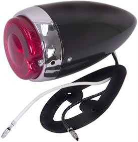 This original look, bullet style black paintable stepside tail light assembly fits 1947-54 Chevrolet and GMC trucks.
