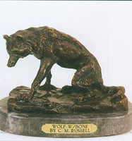 046 Wolf with Bone Bronze Statue by Charles Russell