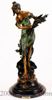 Lady with wheat bronze statue.