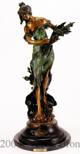 Lady with wheat bronze statue.