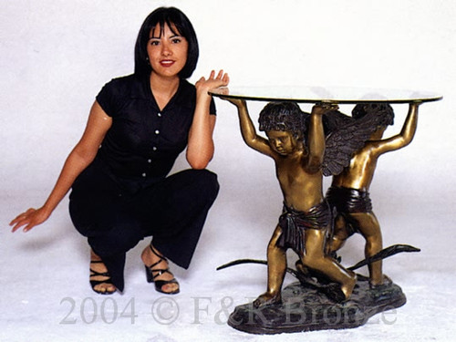 718 Two Cupids Table with Glass by Auguste Moreau

