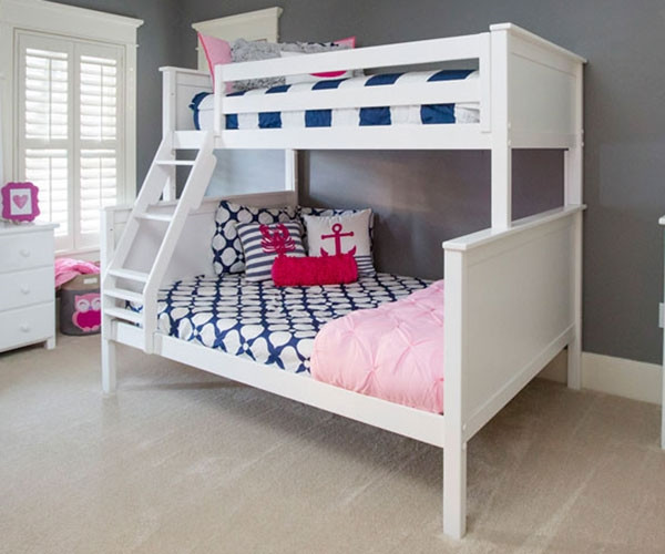 white wooden bunk beds with mattresses