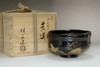 sale: 3rd Raku Nonko style kuro-raku tea bowl by Ito Keiraku