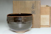 sale: Kondo Yuzo (1902-1985) Black glazed pottery tea bowl