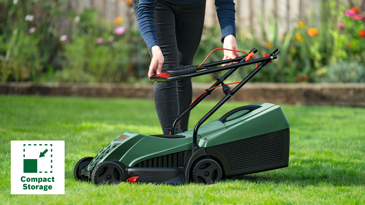 Bosch EasyRotak 32-225 green electric lawnmower with 31L grass box and Ergoflex handles.