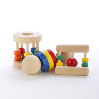 Our natural baby rattle gift pack includes all three of our natural wooden baby rattles to soothe and delight babies throughout their development. The Ladder can be grasped by the smallest of hands, the Ring Shaker is a great teether, and the wooden Roller Rattle keeps older babies entertained for hours. Choke-safe and non-toxic. Made in Oregon, USA.