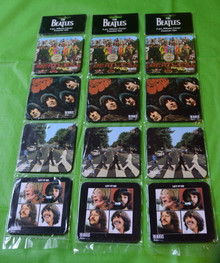 THE BEATLES- 4 ALBUM COASTER SET - 2010 - ABBEY ROAD - SGT PEPPER - RUBBER SOUL